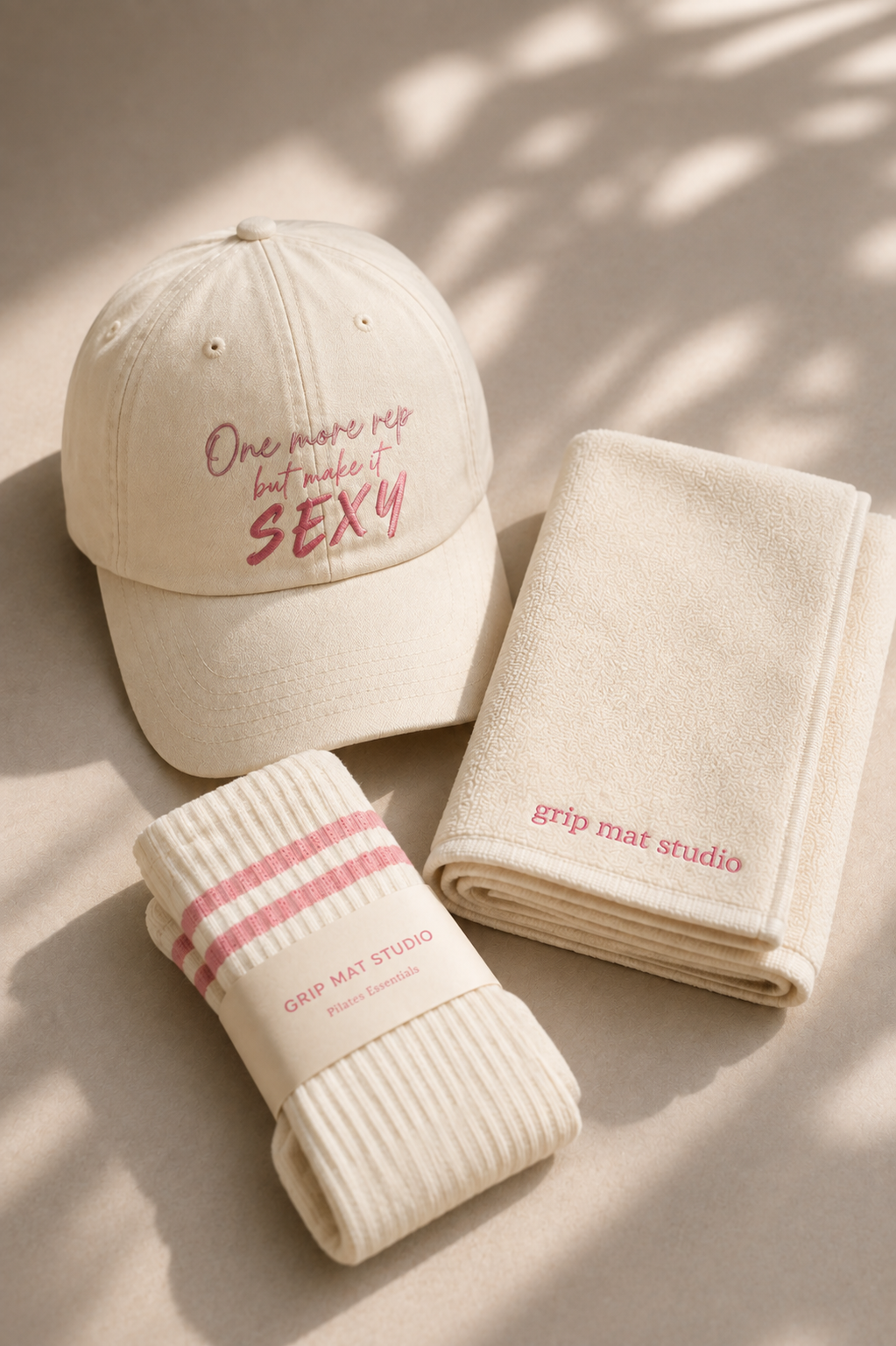 Cream Pilates accessories with grip socks, embroidered cap and studio towel