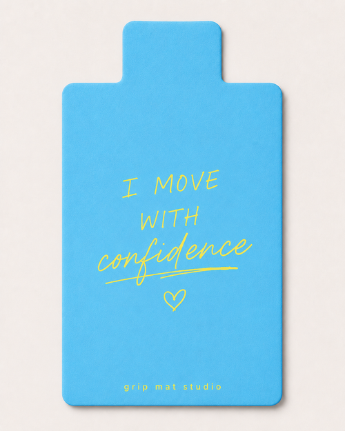 Powder blue I Move With Confidence Pilates reformer grip mat with yellow typography by Grip Mat Studio