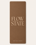 Brown yoga mat with beige “Flow State” text and Grip Mat Studio logo