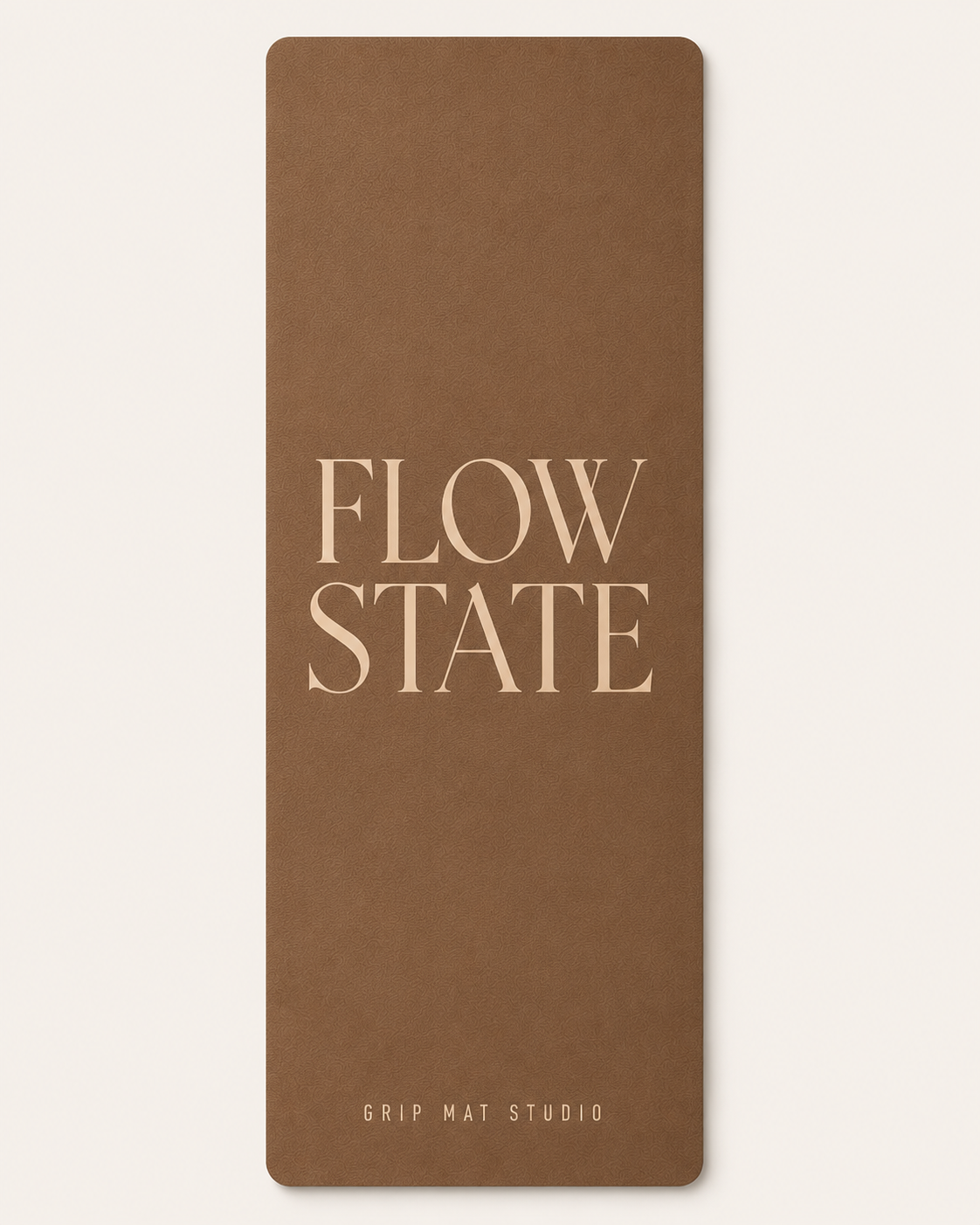 Brown yoga mat with beige “Flow State” text and Grip Mat Studio logo