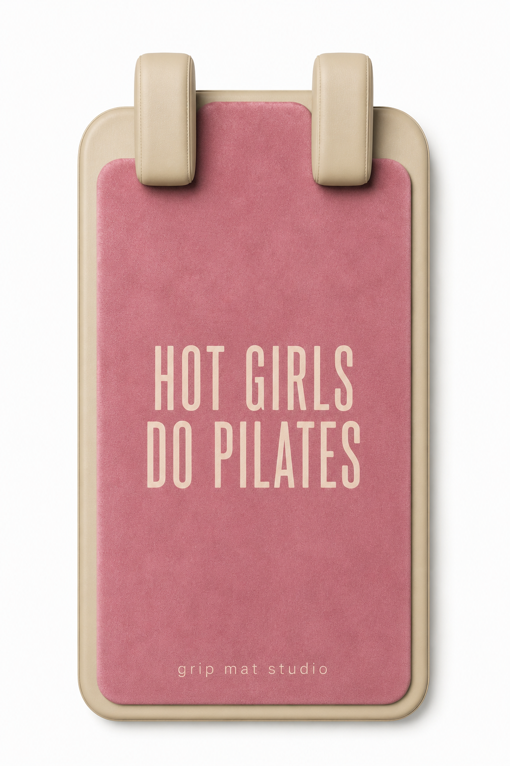 A pink Pilates grip mat with a beige frame and handle, featuring the text 'HOT GIRLS DO PILATES' in beige on the front, by grip mat studio.