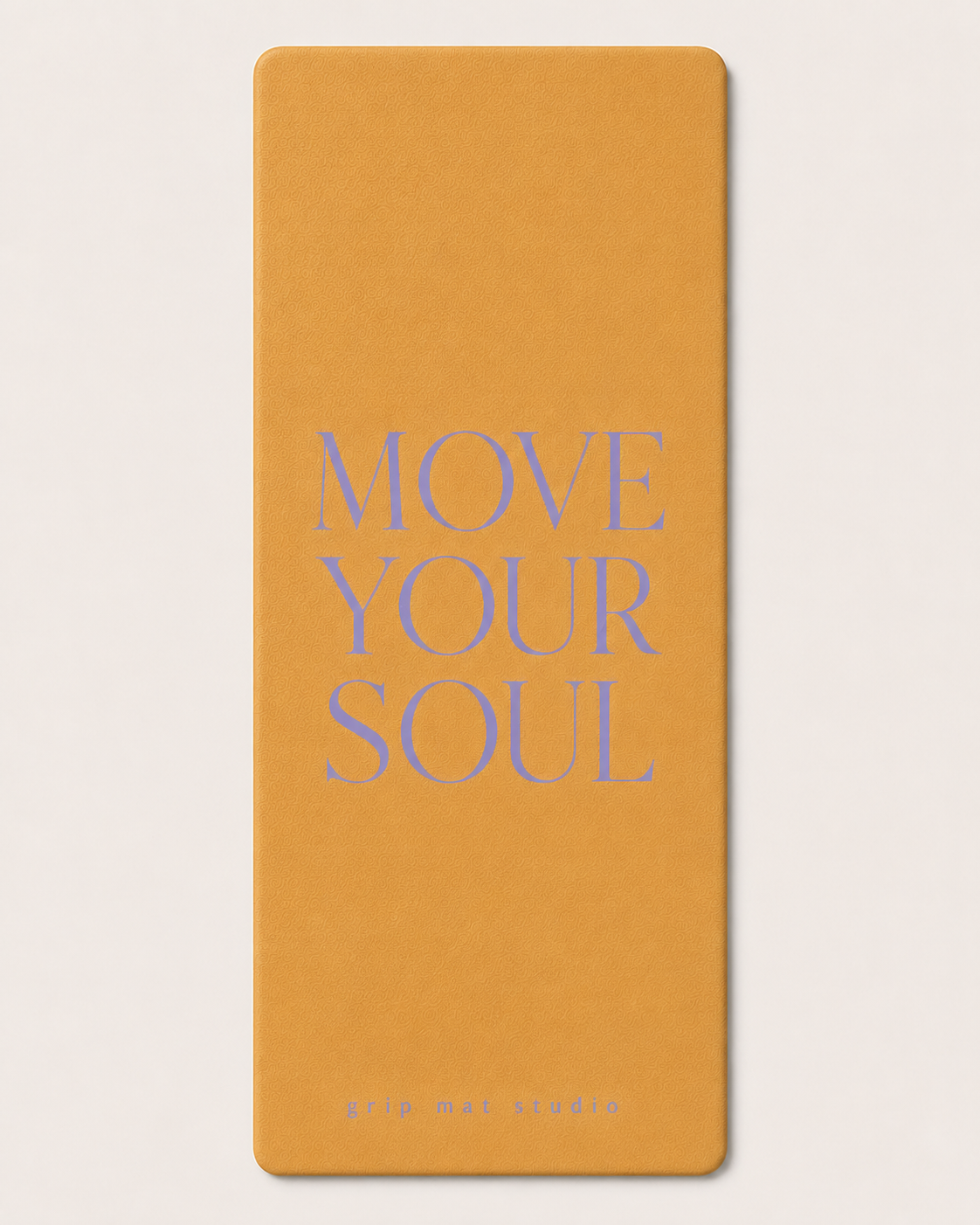 Honey mustard yoga mat with lavender “Move Your Soul” text and Grip Mat Studio logo.