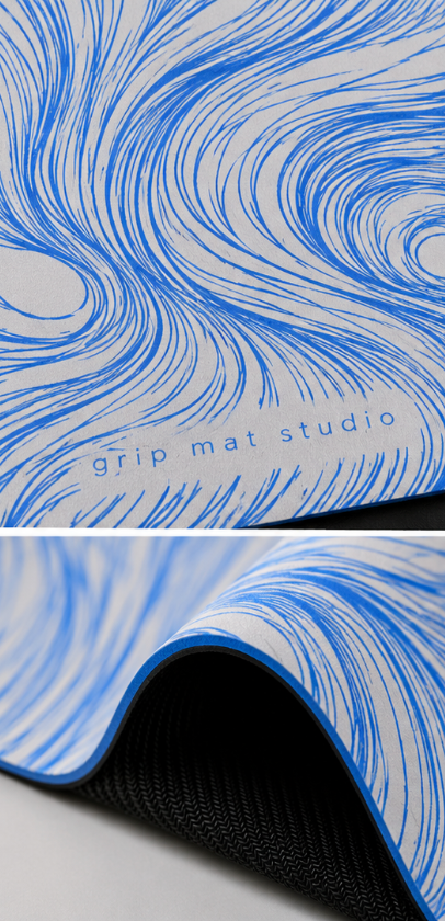 A close-up of a yoga or grip mat with a blue and white swirling line pattern, showing the brand name 'grip mat studio' printed on the surface. The bottom section shows the mat being rolled up, revealing a black textured underside.