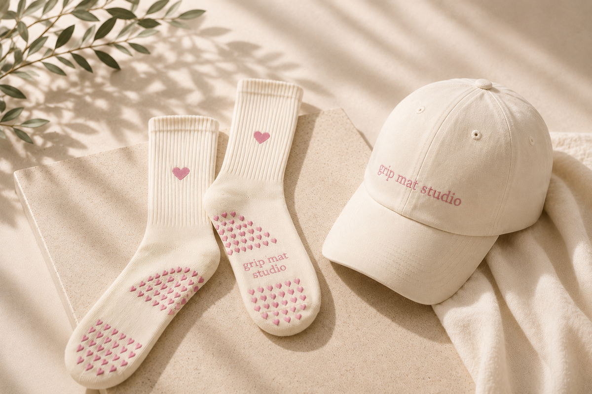 grip mat studio grip pilates socks pink and white and beige with grip hearts and baseball cap with premium fit